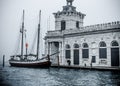 Historic building and a big Sailing boat at venice docks Royalty Free Stock Photo