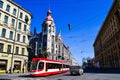 Historic building a castle and modern tram