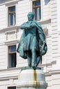 Historic building and statue Kossuth Lajos in Pecs Royalty Free Stock Photo