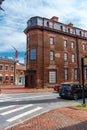 Historic building on the street of old Annapolis at the intersection of the brick pavement Royalty Free Stock Photo