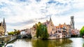 Historic buildings and the Belfort Tower viewed from the Dijver Canal in the medieval city of Bruges, Belgium Royalty Free Stock Photo