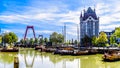 Historic buildings and Canal Boats in Rotterdamin Holland Royalty Free Stock Photo