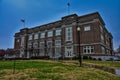 Historic former school building on a rainy day in Emporia Kansas Royalty Free Stock Photo