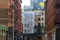 Historic buildings at the intersection of Crosby and Howard Street in the SOHO neighborhood of Manhattan, New York City NYC Royalty Free Stock Photo