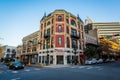 Historic buildings and the intersection of Dauphin Street and Royal Street, in Mobile, Alabama