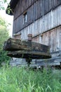 Remains of an old water mill, in the foreground a mill gearbox. Royalty Free Stock Photo