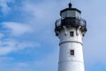 Historic Canal Park Lighthouse against a partly cloudy sky in Duluth Minnesota Royalty Free Stock Photo