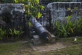 Historic cannon in fortified wall. Fort San Pedro wall cannon. Oldest historical fort in Philippines.