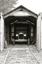 Historic car parked in an old wood garage Royalty Free Stock Photo