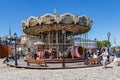 Historic carousel at the port of Honfleur, a small community in the Normandy region, France