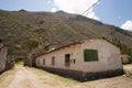 Casa Hacienda de Yaca from the abandoned and dilapidated sugar industry arc and door dirth road 20th century adobe Royalty Free Stock Photo