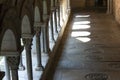 Cloisters at Girona cathedral in Spain. Arches with sunlight and shade.
