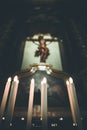 Awestruck catholic church in Italy with electric candles Royalty Free Stock Photo