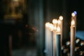 Awestruck catholic church in Italy with electric candles Royalty Free Stock Photo