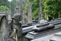 Campo Santo, Sint-Amandsberg, Belgium: Kneeling angel and historic graves