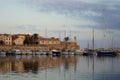 The marina hosts a multitude of yachts and a long sandy beach stretches north. Alghero, Sardinia island, Italy