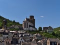 Historic center of Oberwesel with old buildings, church Pfarrkirche St. Martin, part of UNESCO World Heritage Site, and vineyards.