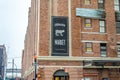 Historic Chelsea Market in New York City Manhattan. Old Building in Meatpacking District. Black Logo Sign