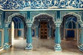 City Palace Jaipur interior hall with medieval architecture with beautiful wall artwork at Rajasthan, India