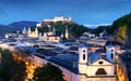 Historic city of Salzburg with Hohensalzburg Fortress at dusk, S