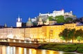 Historic city of Salzburg with Hohensalzburg Fortress at dusk, S