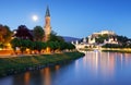 Historic city of Salzburg with Hohensalzburg Fortress at dusk, S