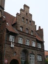 Historic clinker brick house with stepped gable in LÃ¼beck Germany Royalty Free Stock Photo