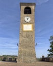 Historic Clock Tower in the Roma Square of the Ancient Village of Castelvetro of Modena, Italy.