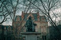 Historic College Hall and Benjamin Franklin Statue in the evening Royalty Free Stock Photo