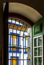 Historic colonial style house seen through the window Royalty Free Stock Photo