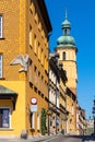Historic colorful tenement houses and St. MartinÃ¢â¬â¢s Church tower at Piwna street in Starowka Old Town quarter of Warsaw, Poland Royalty Free Stock Photo