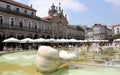 Historic commercial arcade and Lapa Church facing the Republic Square, Braga, Portugal