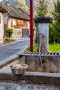 Historic communal street water well and pump