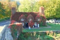 Historic cottage covered in virginia creeper