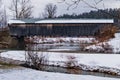 historic covered bridge crosses a river Royalty Free Stock Photo