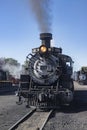 Historic Cumbres Toltec narrow-gauge train steam engine in Chama, New Mexico station