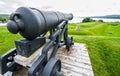 Historic defence, cannons, now relics of the past, sit on their mounts.