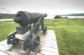 Historic defence, cannons, now relics of the past, sit on their mounts. Royalty Free Stock Photo