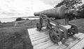 Historic defence, cannons, now relics of the past, sit on their mounts. Royalty Free Stock Photo