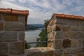 Historic defensive wall of a stone castle in Poland in Dobczyce on a summer day overlooking the lake