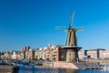 The historic Delfshaven district with windmill in Rotterdam, The Netherlands. South Holland region. Summer sunny day