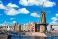 The historic Delfshaven district with windmill in Rotterdam, The Netherlands. South Holland region. Summer sunny day