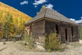 Historic deserted cabin surrounded by Autumn Color, outside of S Royalty Free Stock Photo