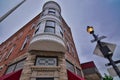 Historic downtown building featuring a rounded corner room