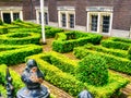An historic dutch building labyrinth hedges plants fence