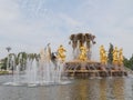 Historic fountain with golden sculptures