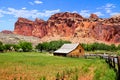 Historic Fruita Barn and red mountains of Capitol Reef National Park, Utah, USA Royalty Free Stock Photo