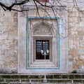 Historic Gazi Orhan Mosque, 14th century ottoman architecture, the mosque was built in 1339. Exterior view from mosque. Bursa, Tur