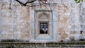 Historic Gazi Orhan Mosque, 14th century ottoman architecture, the mosque was built in 1339. Exterior view from mosque. Bursa, Tur