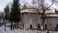 Historic Gazi Orhan Mosque, 14th century ottoman architecture, the mosque was built in 1339. Exterior view from mosque. Bursa, Tur